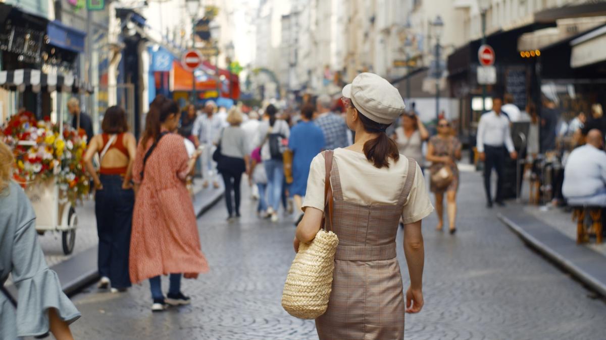 A picture of a person walking in france