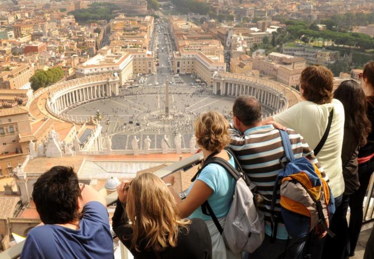 group of students looking down at some Italian architecture