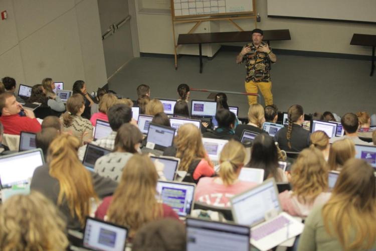 a professor teaching in a classroom