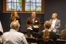 Sean Franzel, center, speaks at the Faculty Book Authors Celebration during Faculty Excellence Week 2024.